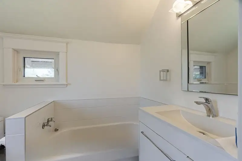 Upstairs bathroom with tub at 367 Huron St
