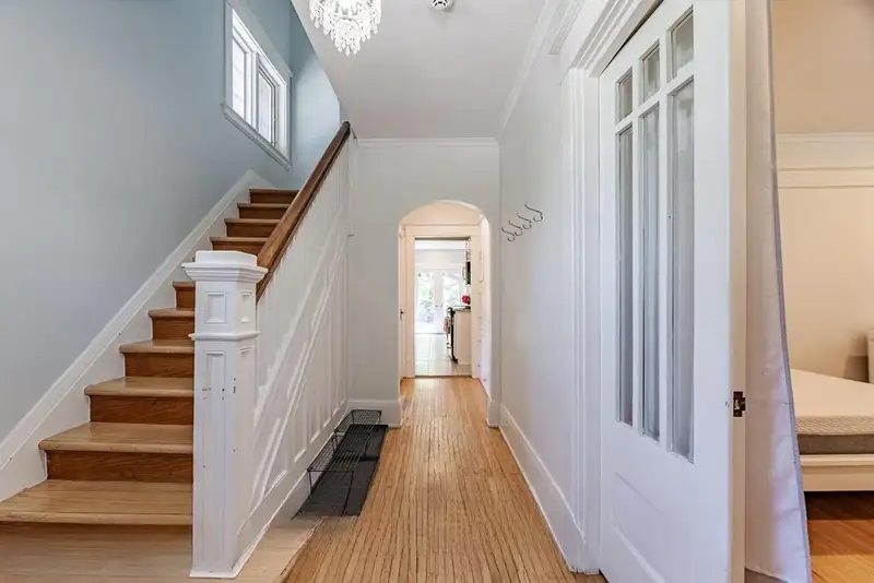 Hallway and staircase at 367 Huron St
